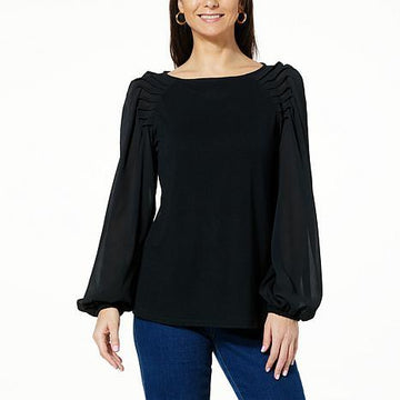 Lifestyle image of model wearing the DG2 Pintuck Raglan-Sleeve Shirt, styled casually with jeans.- fashioncurb