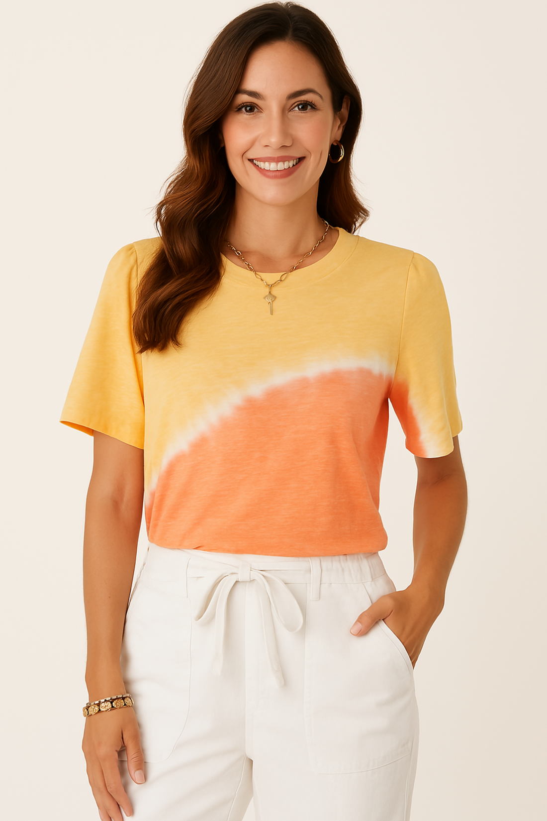 Close-up of woman in Democracy orange and yellow tie-dye tee with off-the-shoulder neckline, styled with black sunglasses for a trendy summer vibe.
