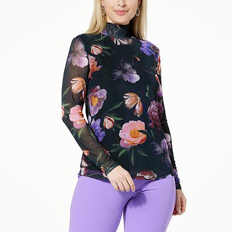 Model wearing DG2 printed mesh turtleneck with Ntrocl design - fashioncurb